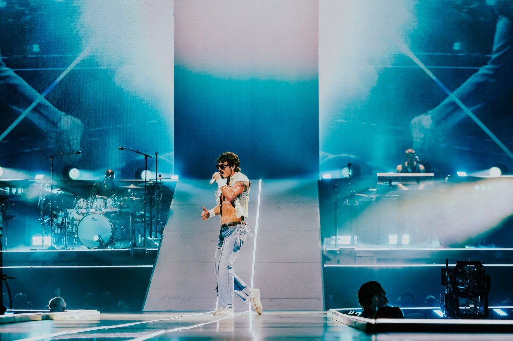 Benson Boone performing live at Ball Arena in Denver, Colorado, on July 30 for his Wanted Man Tour 2026.