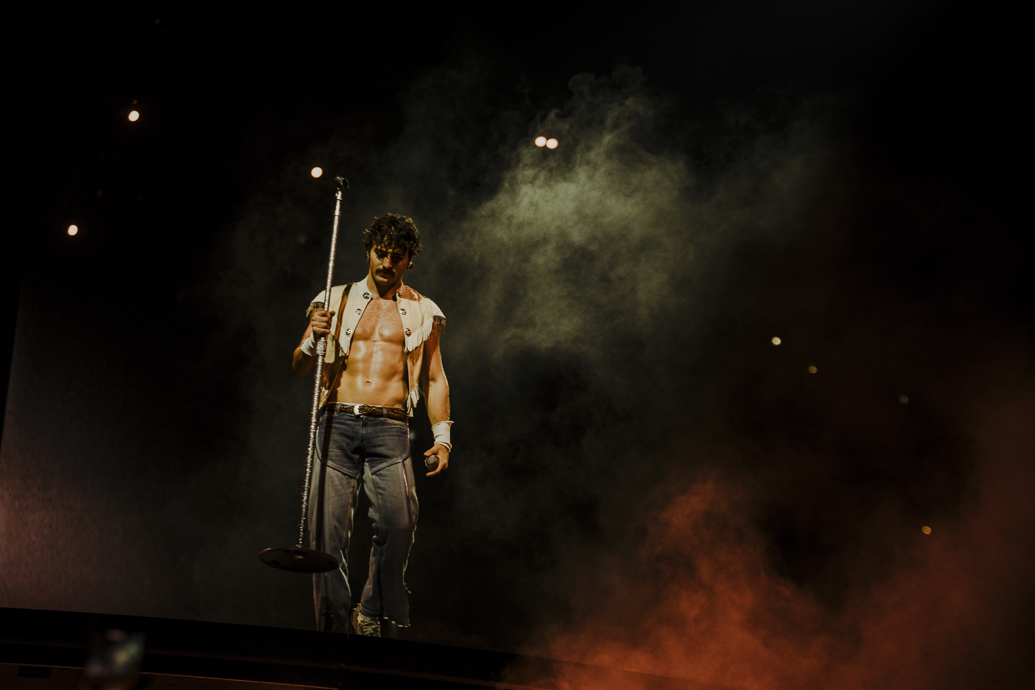 Benson Boone performed live at Ball Arena in Denver on July 30 for his Wanted Man Tour. Pop singer Ashe opened for him.