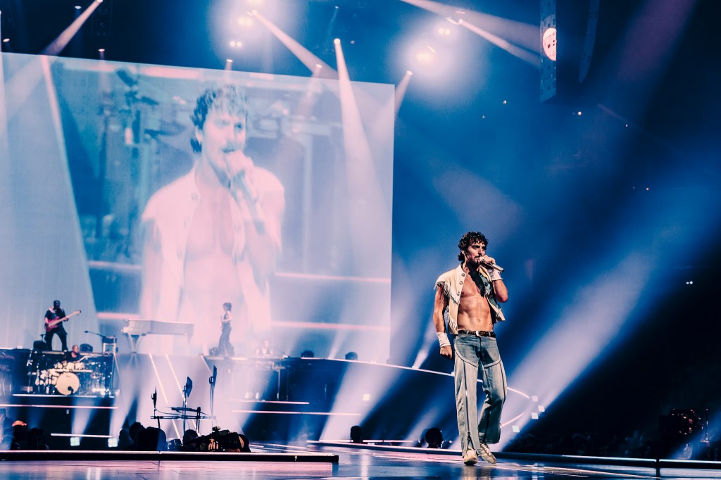 Benson Boone performing live at Ball Arena in Denver, Colorado, on July 30 for his Wanted Man Tour 2026.