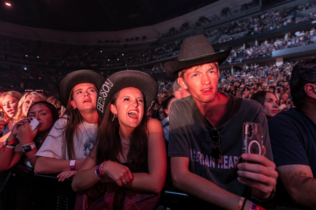 Concertgoers at Ball Arena in Denver, Colorado, for the Benson Boone concert.