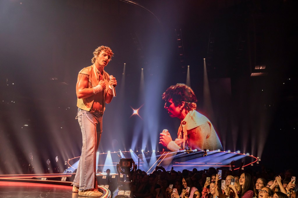Benson Boone performing live at Ball Arena in Denver, Colorado, on July 30 for his Wanted Man Tour 2026.