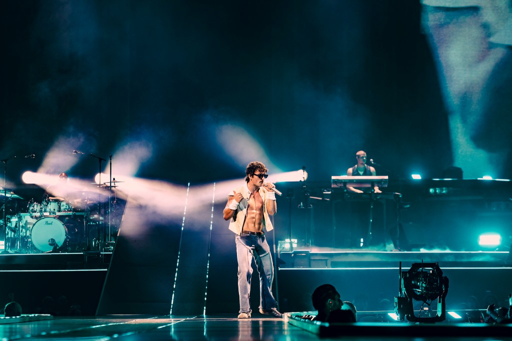 Benson Boone performing live at Ball Arena in Denver, Colorado, on July 30 for his Wanted Man Tour 2026.
