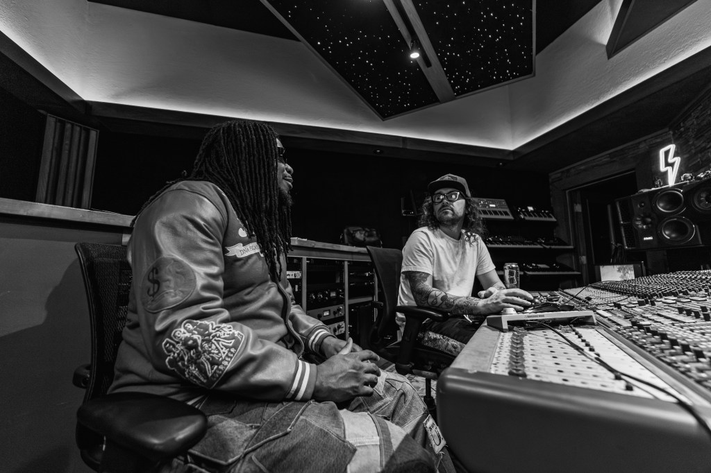 two men at control desk
