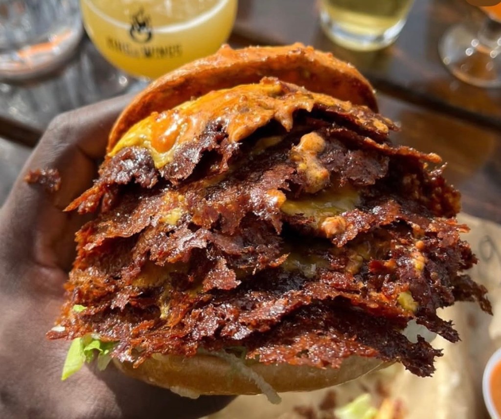 Snipeburger piles on the smashed, lace-edged patties