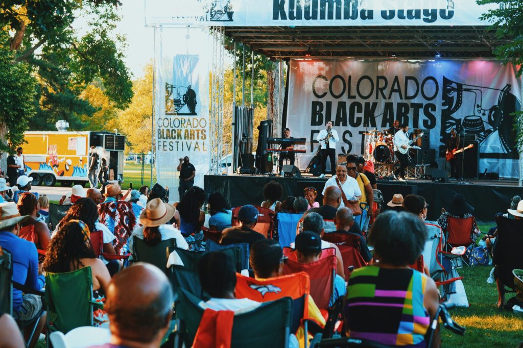People at an outdoor stage