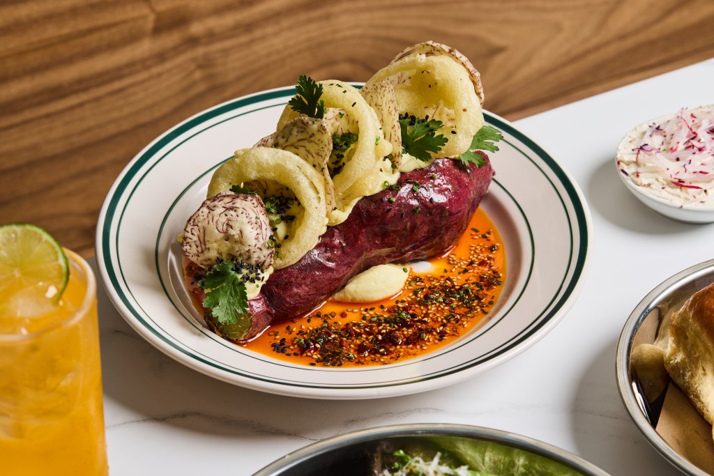 The Japanese sweet potato dish topped with onion rings and taro chips