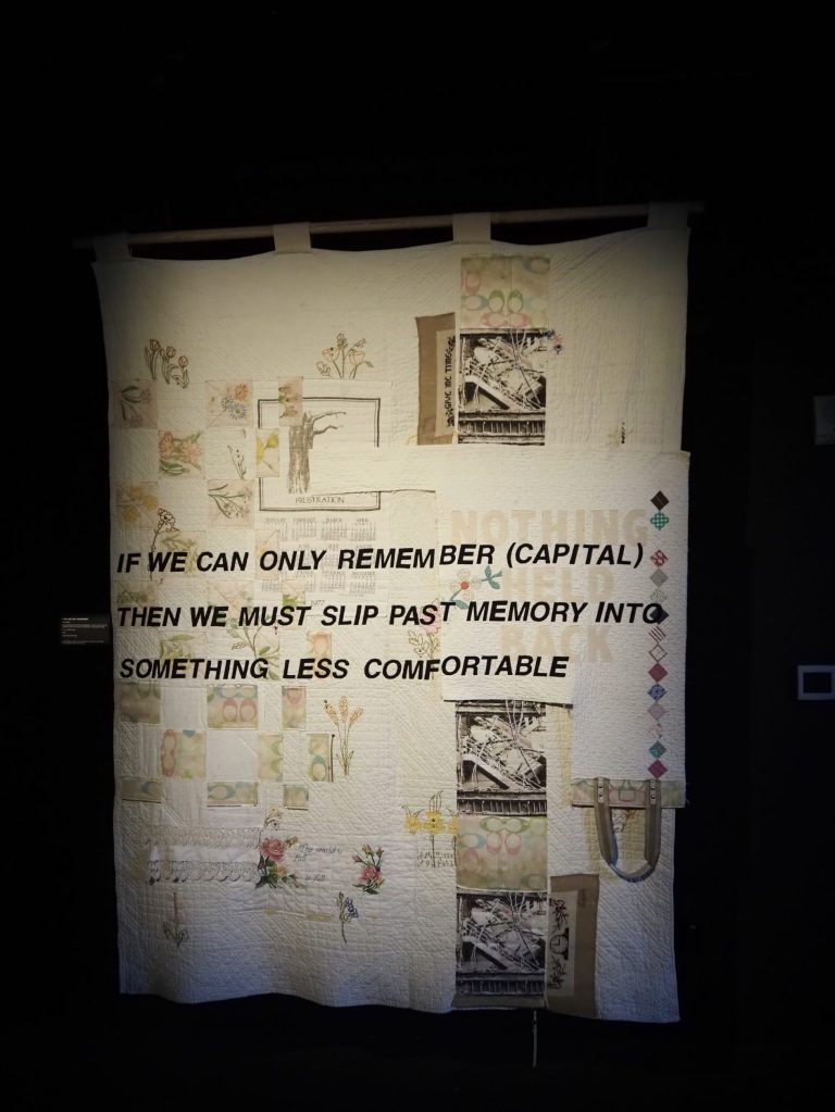 A quilt with words and pictures