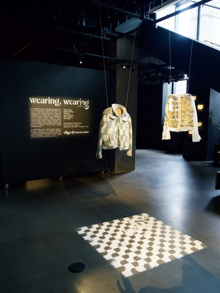 A jacket hangs over a salt pattern on the floor