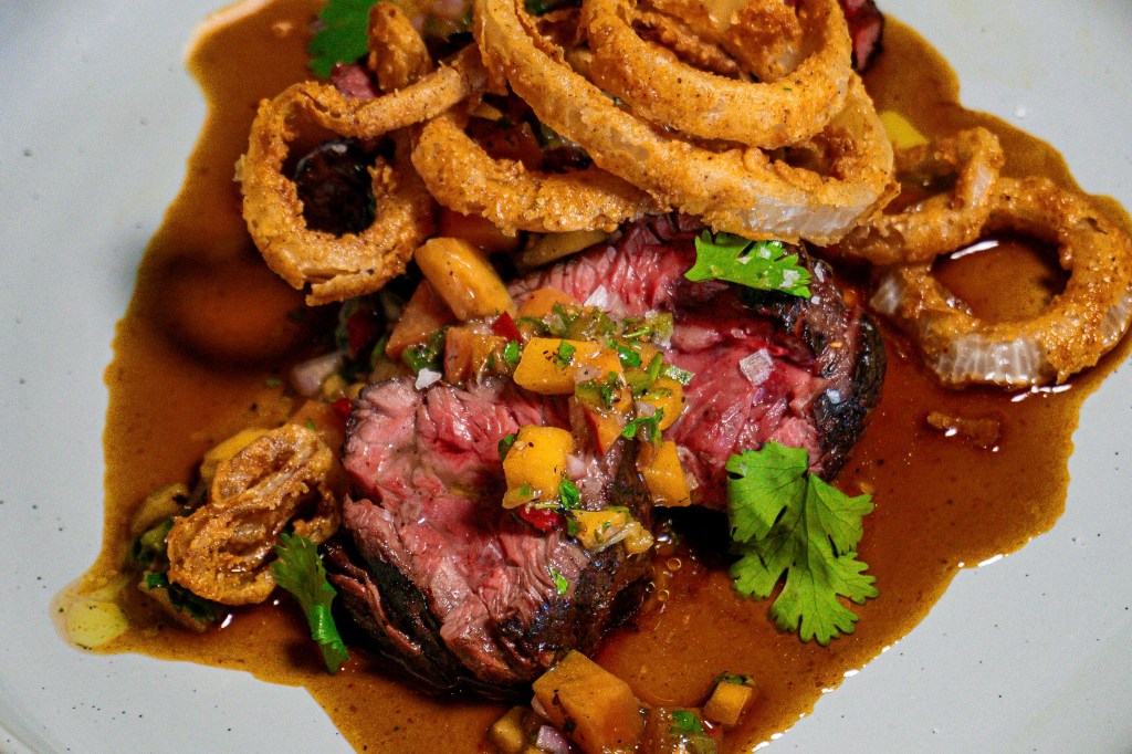 A peach-jalapeño relish on steak
