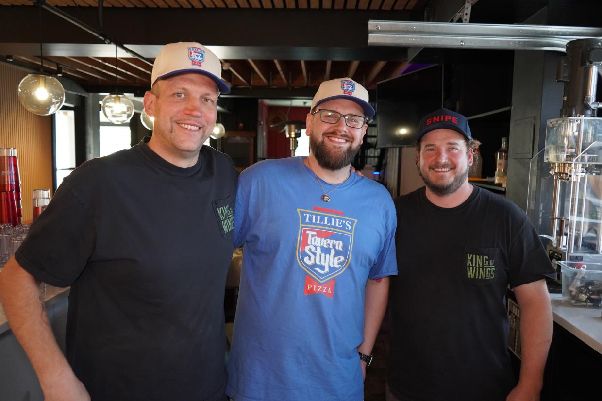 Eddie Renshaw, left, and Evan Pierce, right, are opening Snipeburger and Tillie's Tavern Style Pizza in the former Colorado Plus building. Mitch Conley, center, is the pizzeria chef.