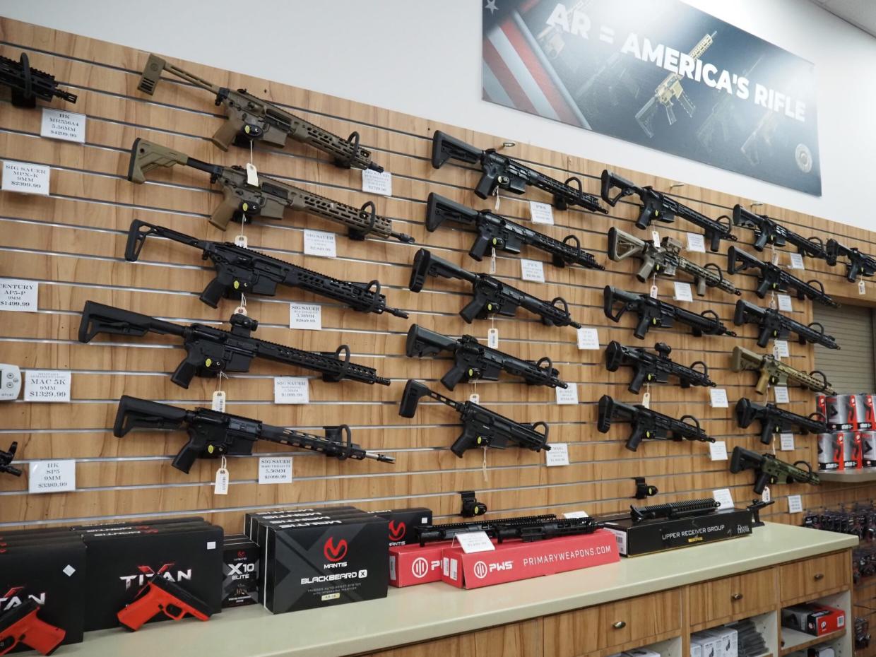 Firearms for sale are displayed at the Centennial Gun Club in Centennial on June 12, 2026.