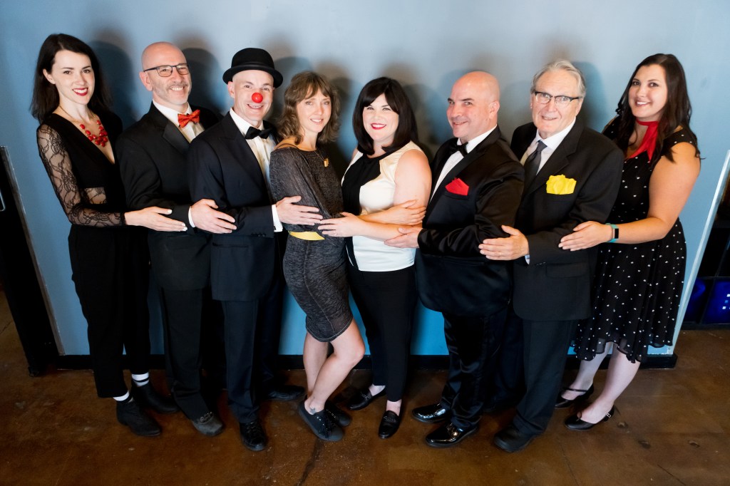 Performers pose together