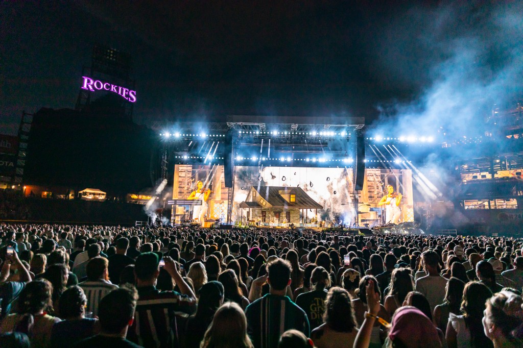 Noah Kahan performing live at Coors Field in Denver, Colorado for night one of two of The Great Divide Tour.