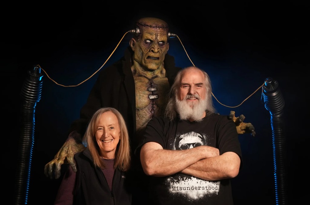 Marsha Taub-Edmunds and Ed Edmunds pictured alongside their Frankenstein animatronic