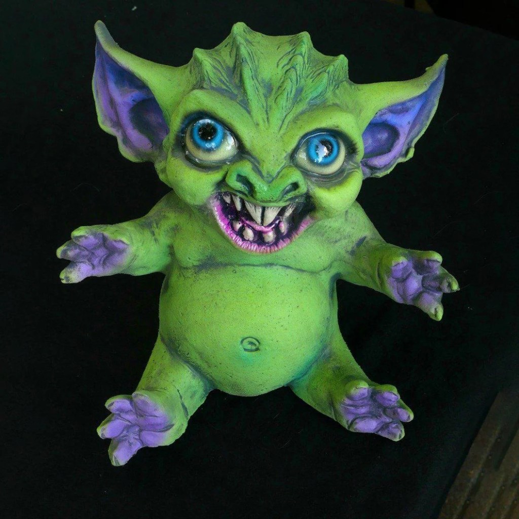 A green and purple gremlin by Distortions Unlimited