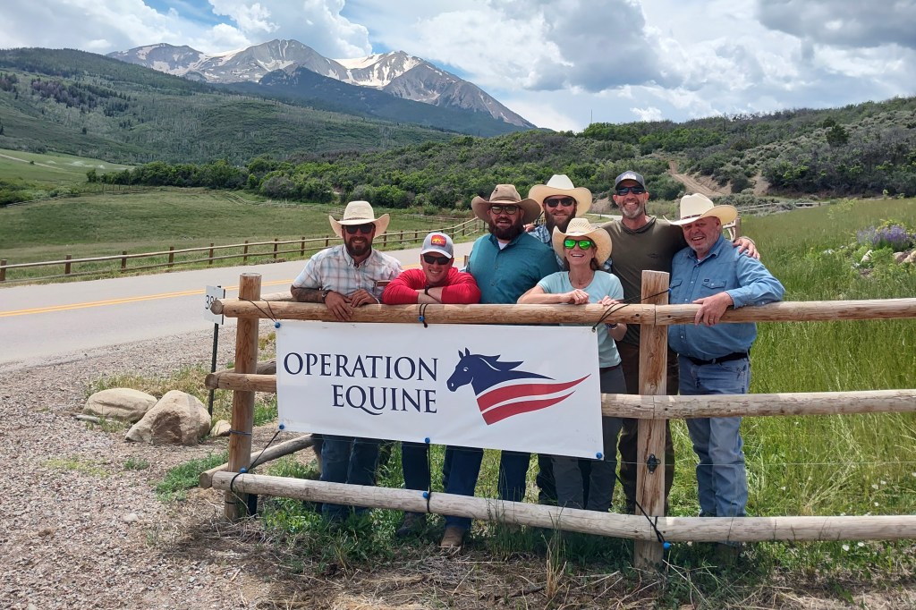 A group of male veterans on a Warrior Pack Trip with Operation Equine