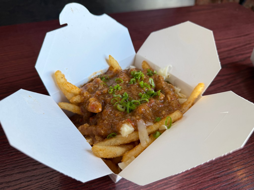 cajun fries with crawfish étouffée