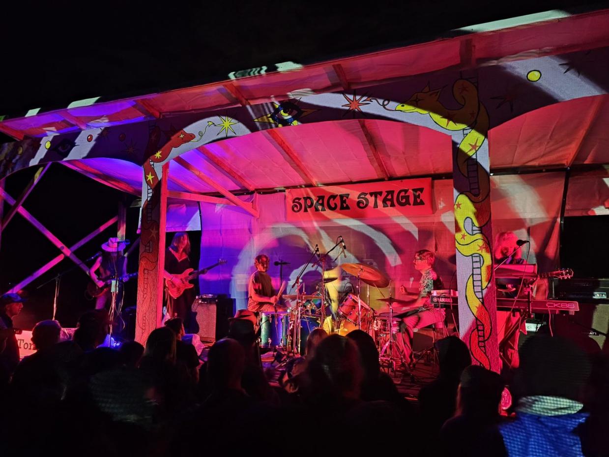 Psychs Peak band plays on stage