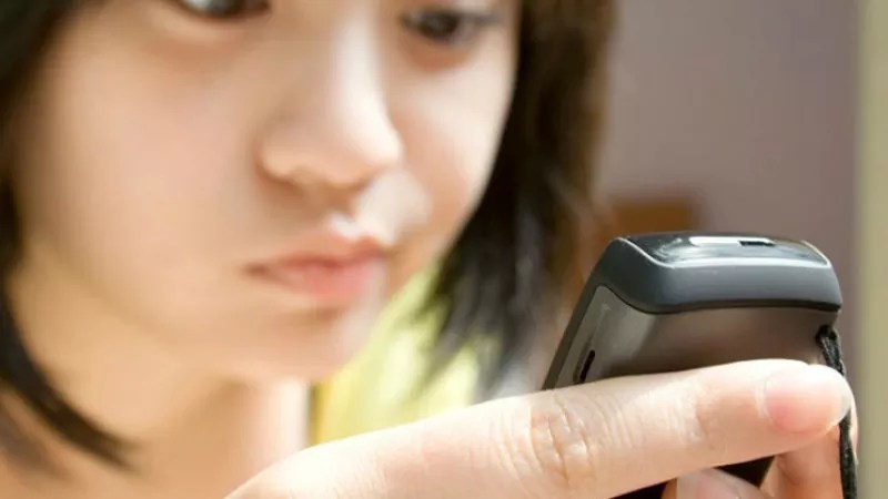 child on phone