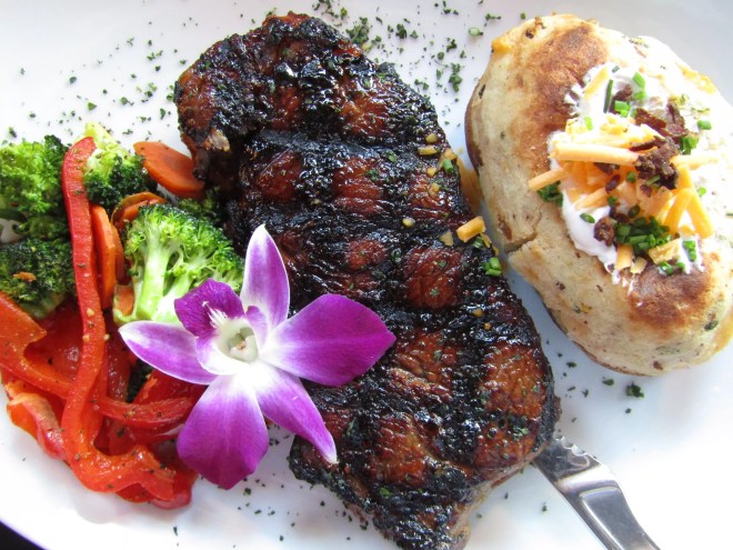 a grilled steak on a plate