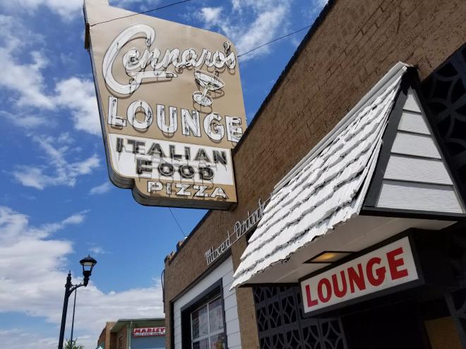vintage sign on the outside of a building