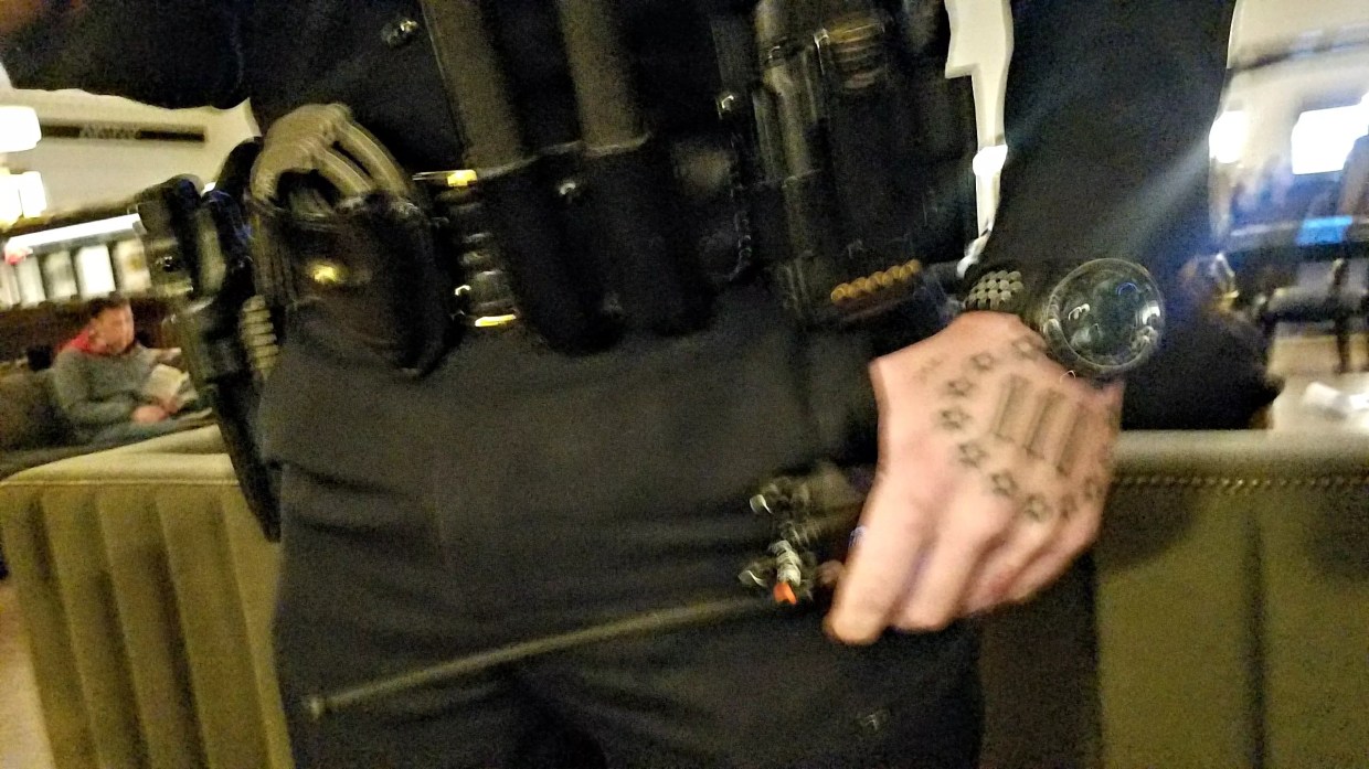 Denver Cop Who Killed Has Tattoo That Matches Militia Group Logo