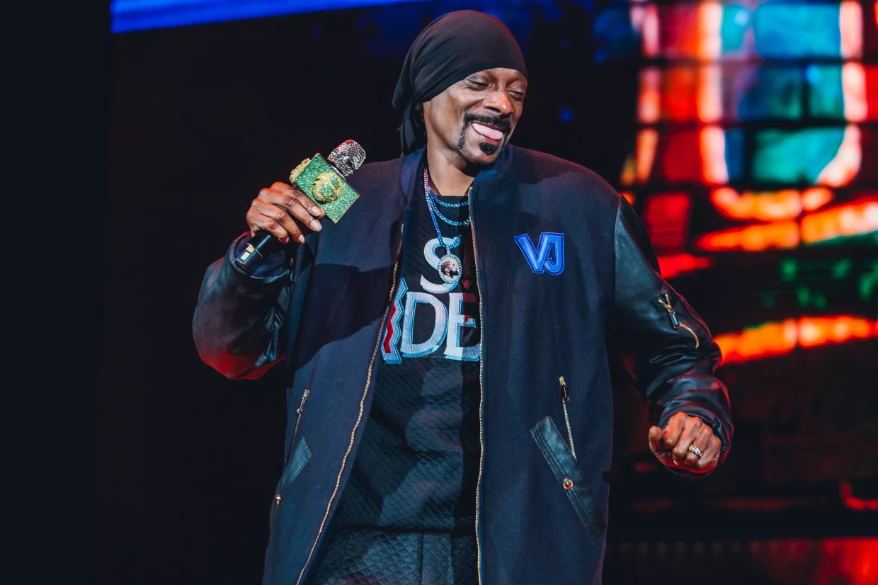 Snoop Dogg laughs on stage during a Colorado concert