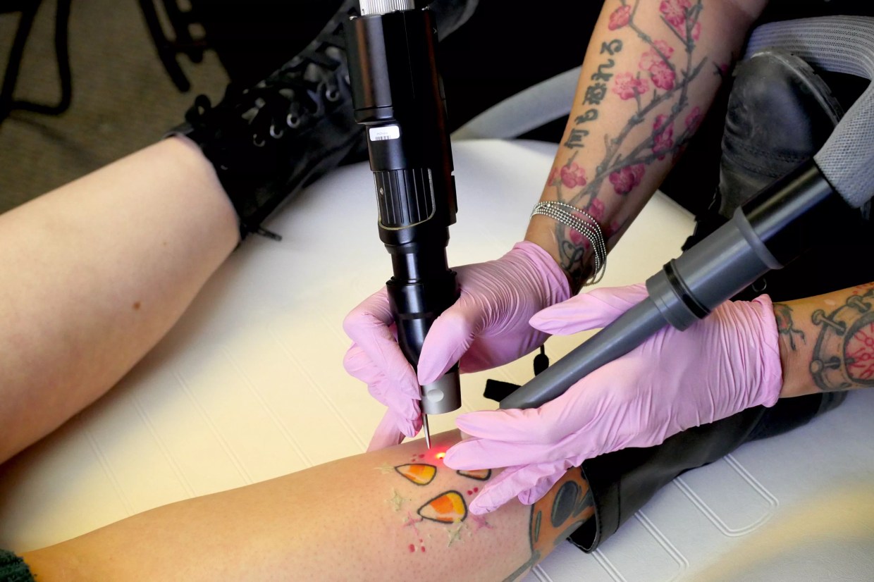 A person gets a tattoo