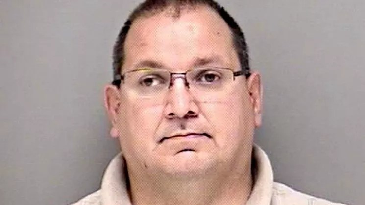 Feds Lower Boom on Alleged Rapist Ex-Cop Given Wrist Slap