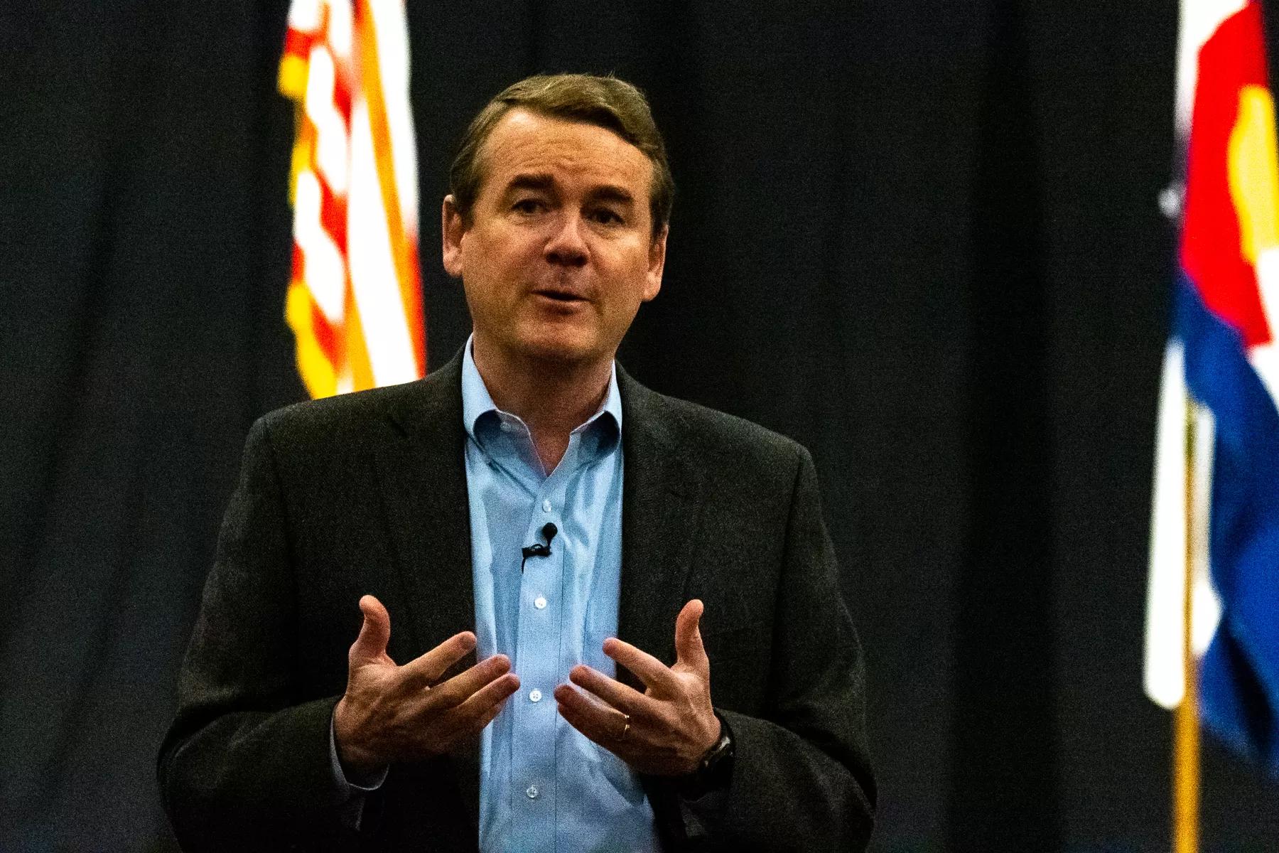senator Michael Bennet speaks during meeting