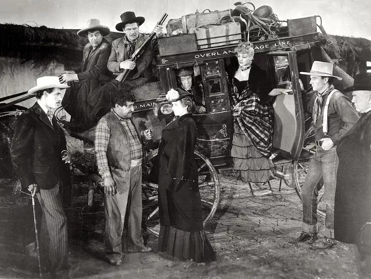 actors by a stagecoach