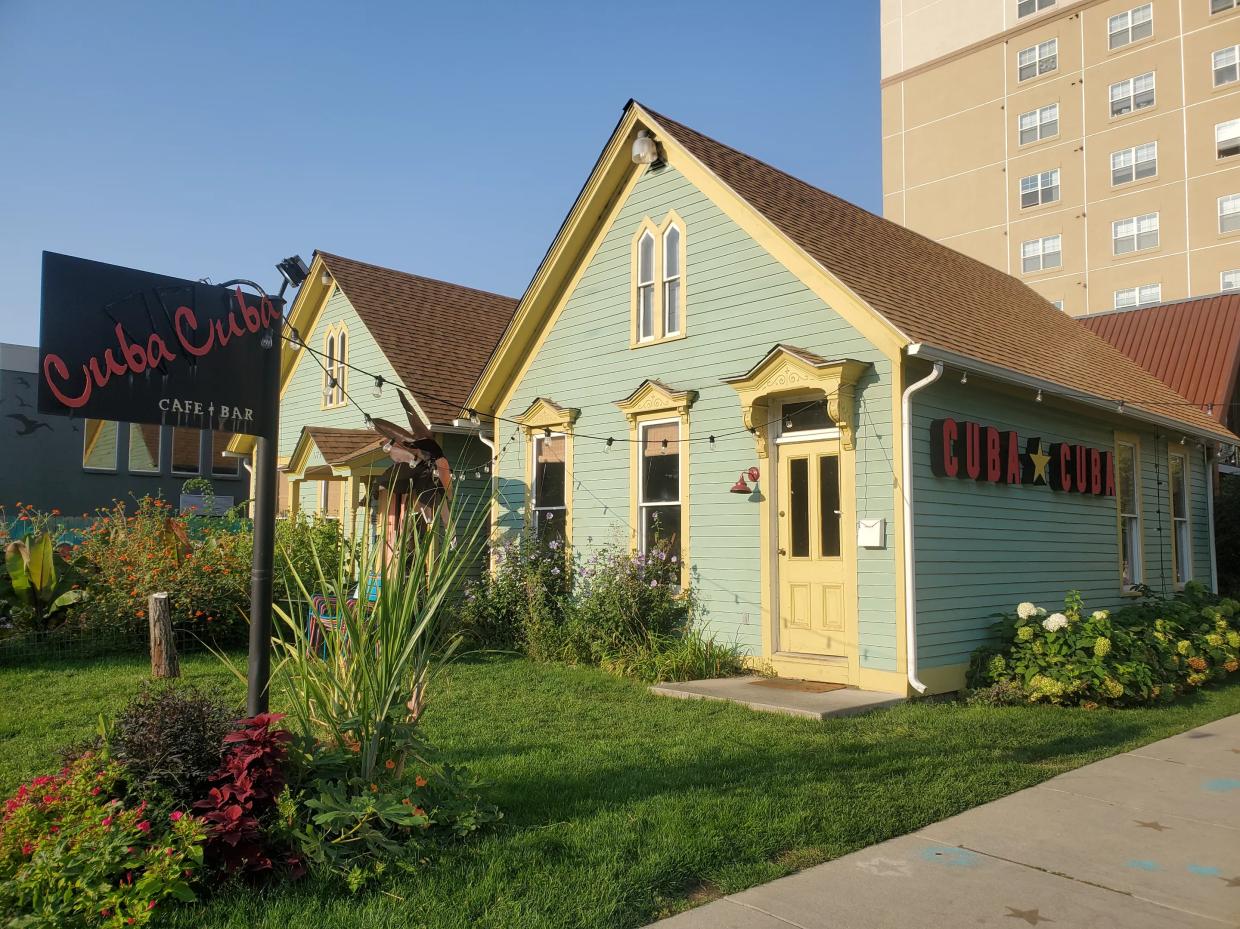 two teal houses
