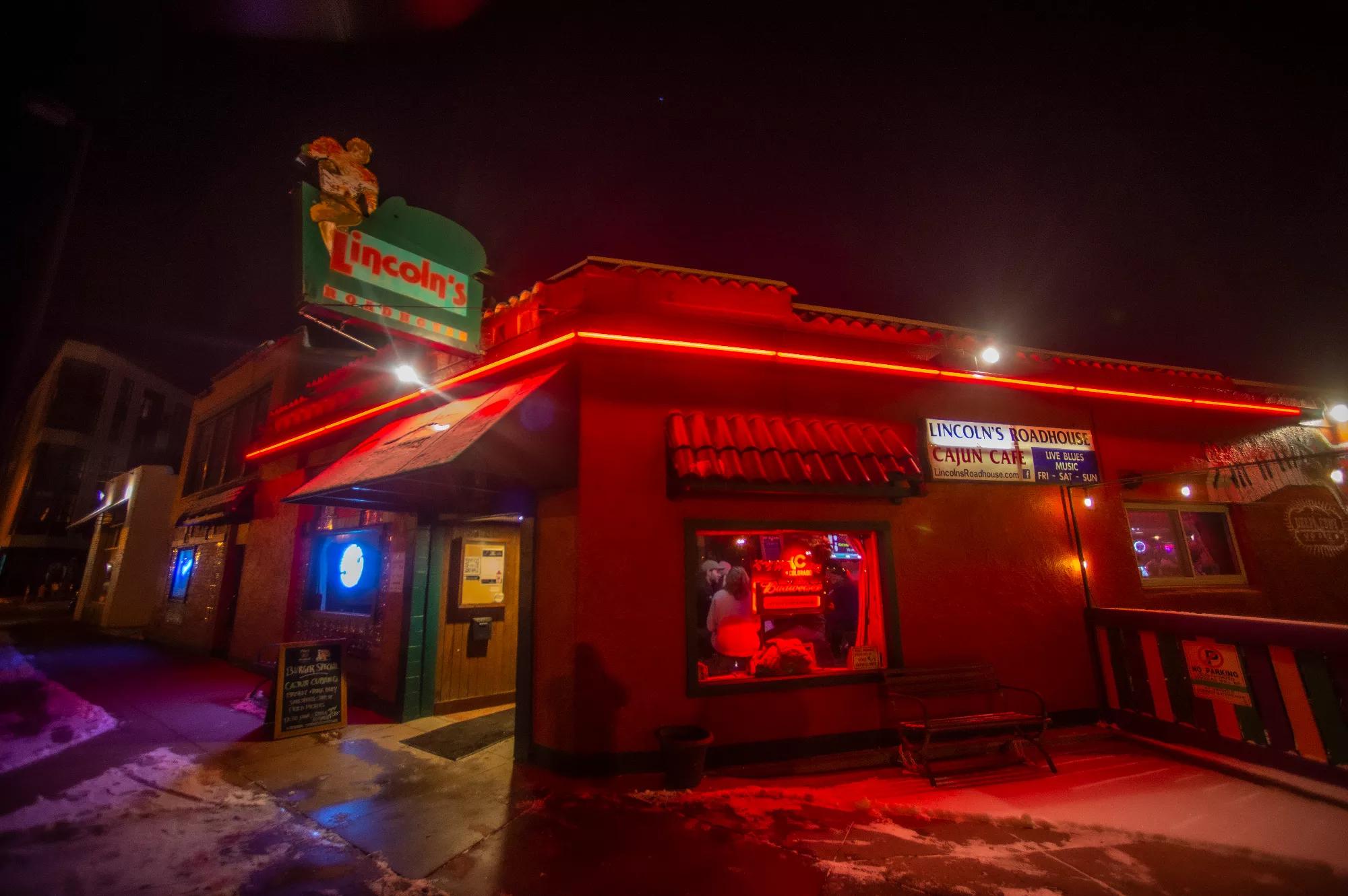 bar with neon lights outside