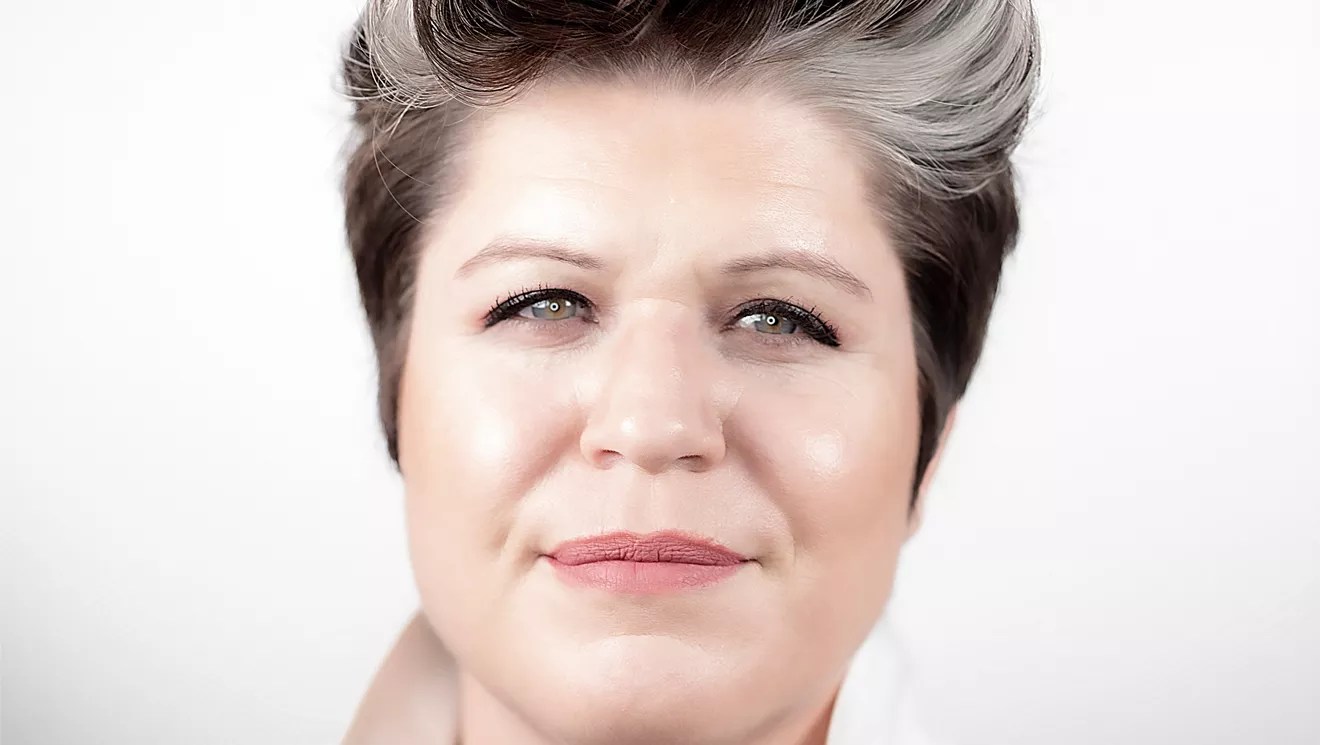 white woman smiling