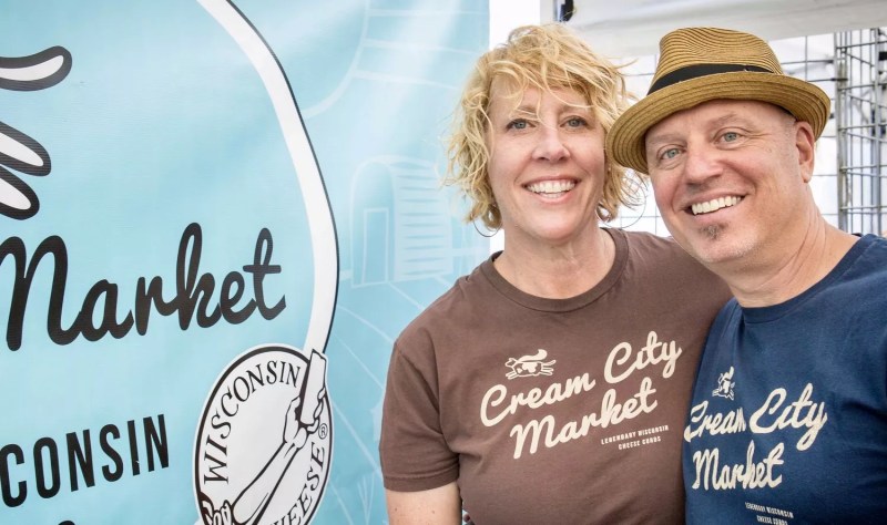 a man and a woman smiling