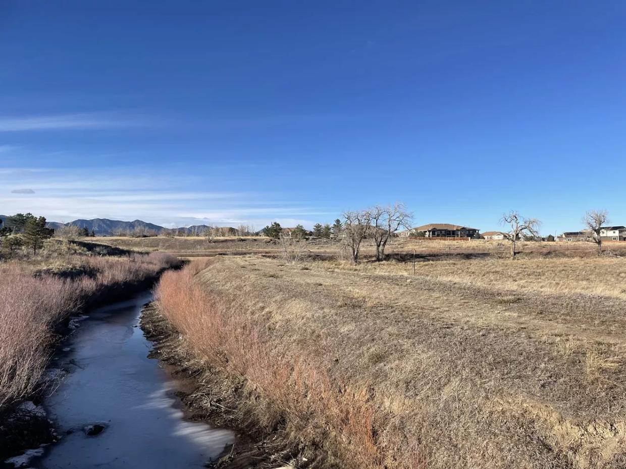 The Farmers Highline Canal winds across a dry Jefferson County landscape.