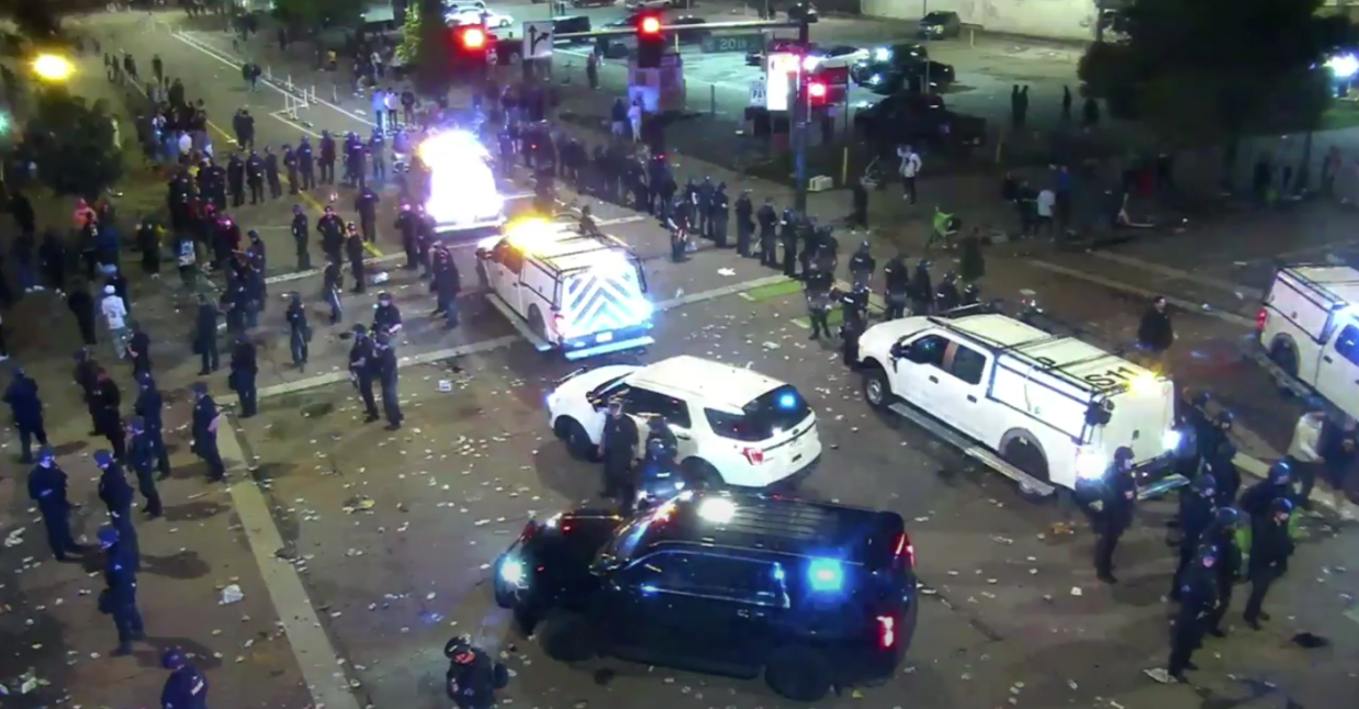 street scene in Denver with cops after shooting