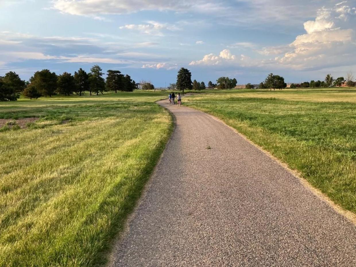 people walking in Park Hill Golf Course