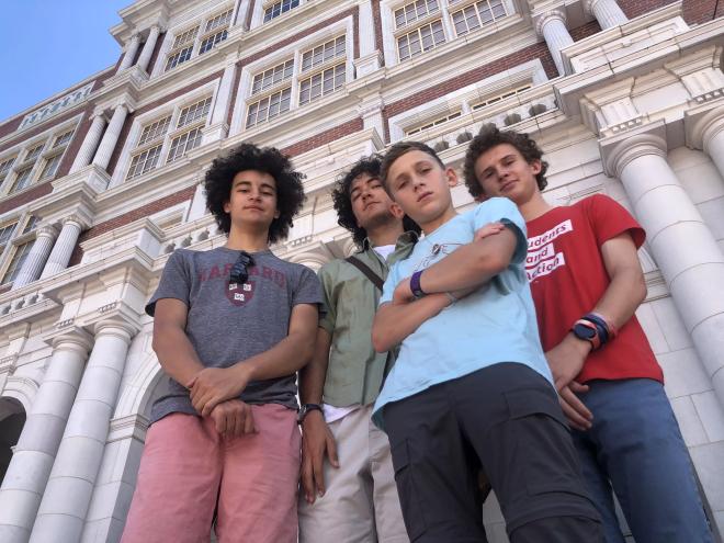 From left: Beckett Nelson-Gardner, Caden Fiala, Seth Shurz and Noah Shurz standing in front of East High School.