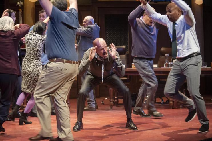 actors on a stage screaming