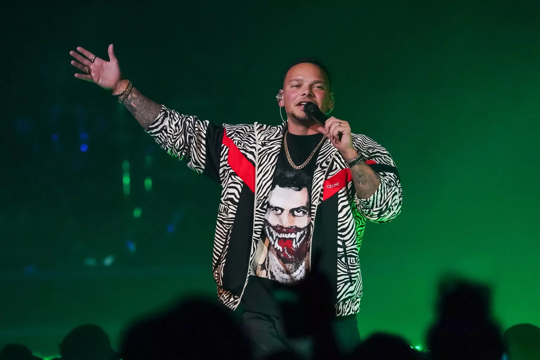 man rapping into microphone