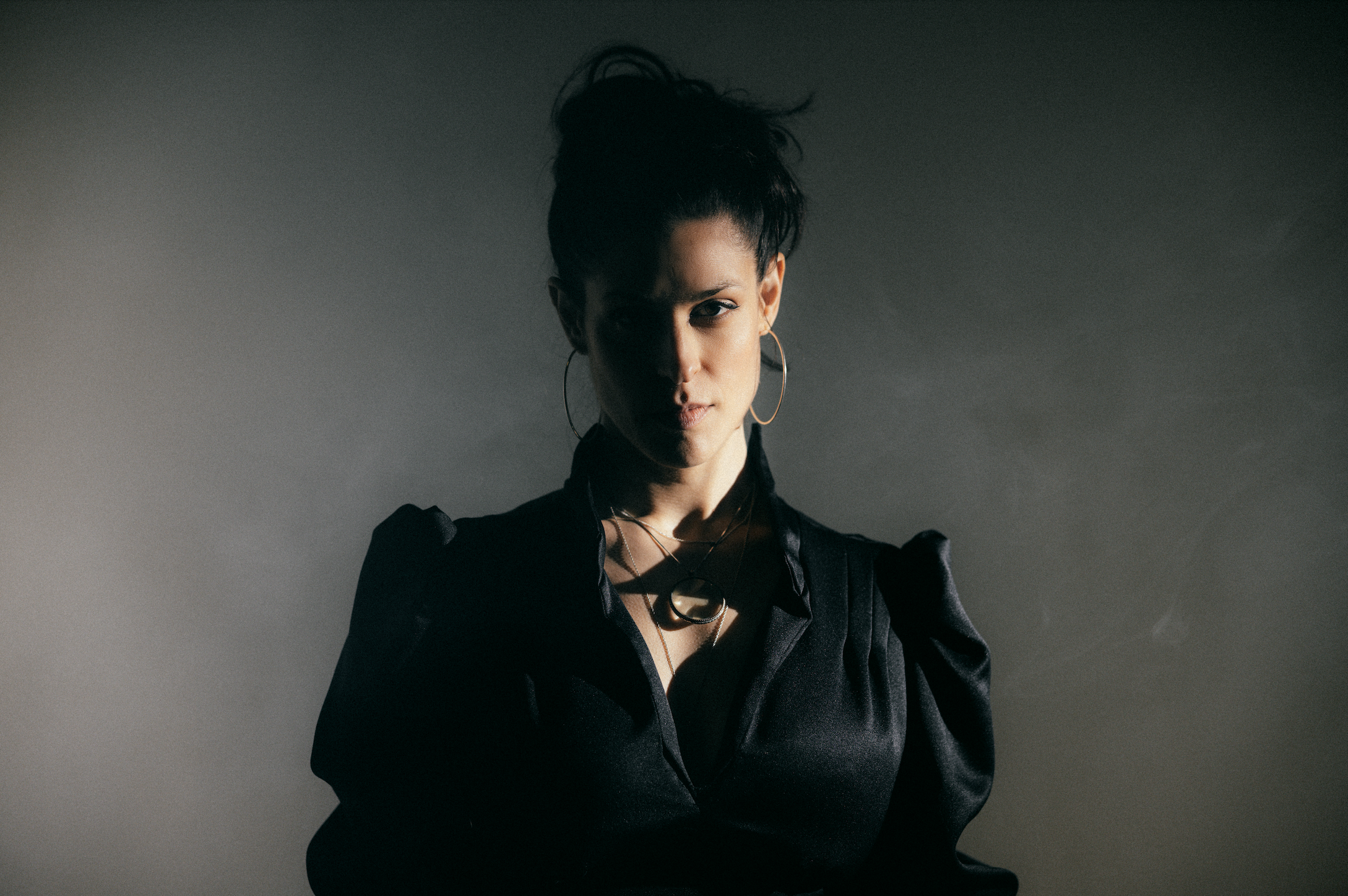 woman in black shirt.