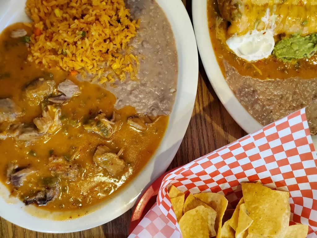 green chile, rice and beans on a plate