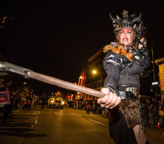 woman in costume with sword