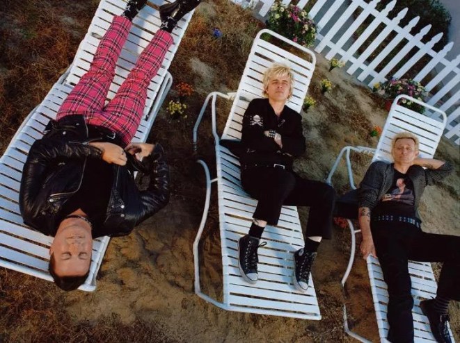 men sitting on lawn chairs