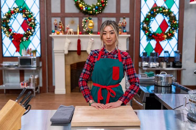 woman in a red and white apron
