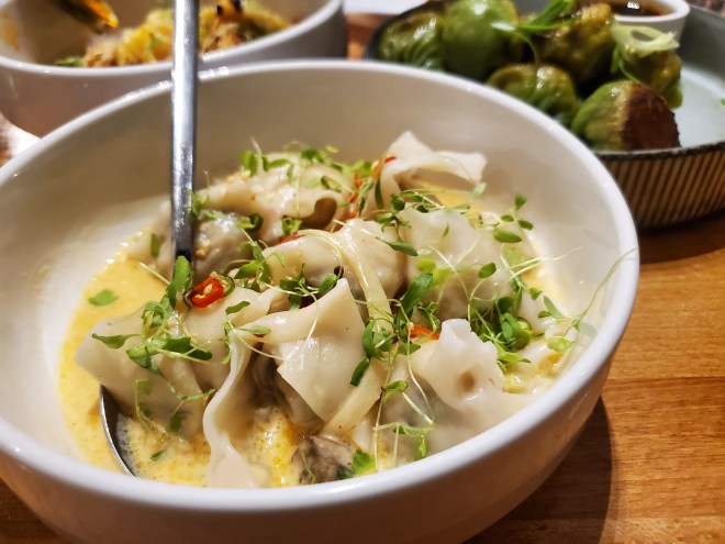 wontons in a white bowl