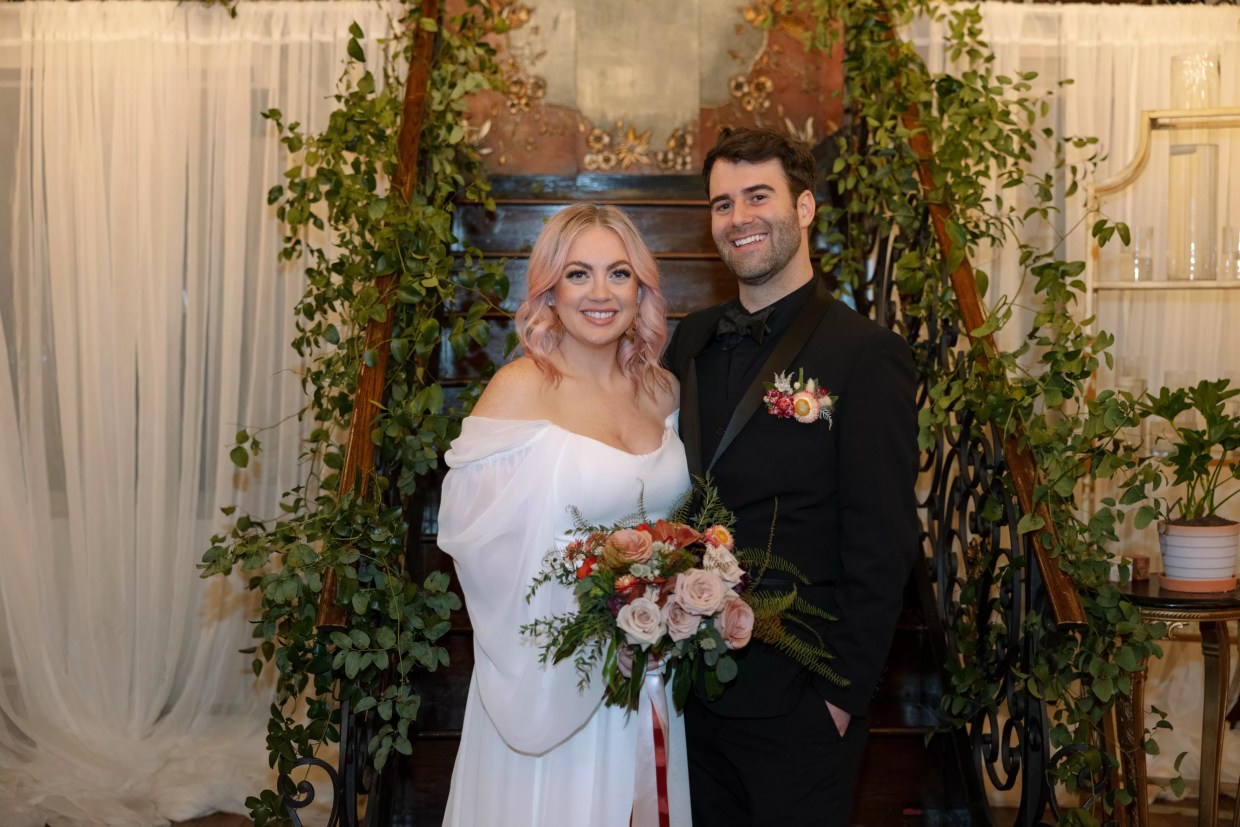 Becca and Austin pose for wedding portraits