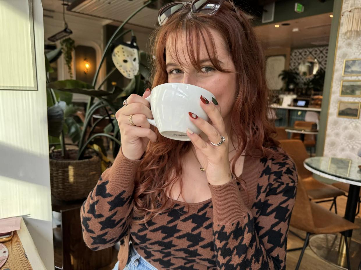 woman drinking coffee