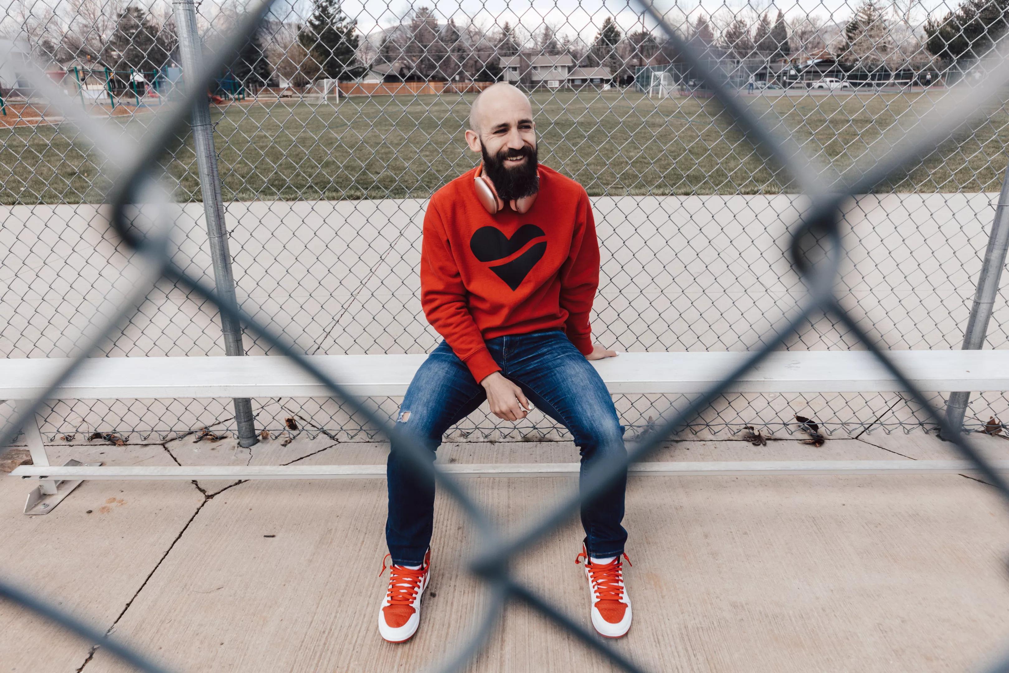 man in red sweatshirt